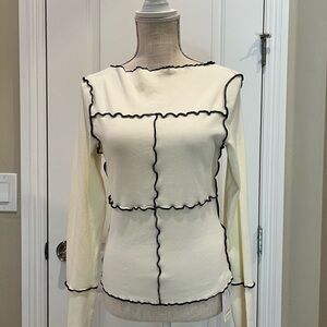 Elegant Cream Knit Top with Black Trim